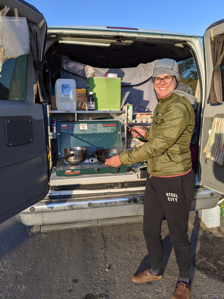 cooking breakfast in a campervan