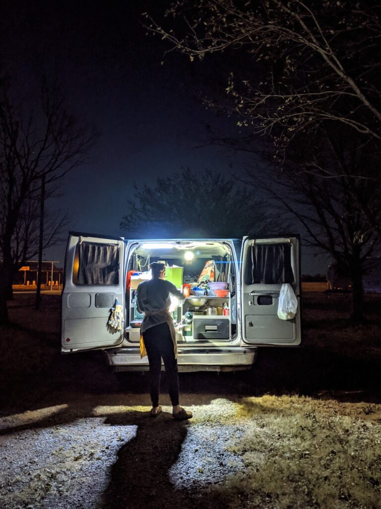 cooking in a campervan at an RV park
