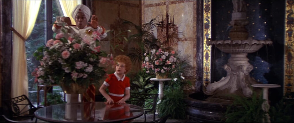 screenshot from the film Annie - Punjab and Annie in the mosaic conservatory room