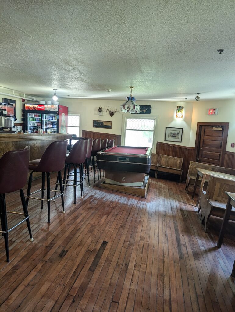 Tiltin Hilton bar interior with sloping floor